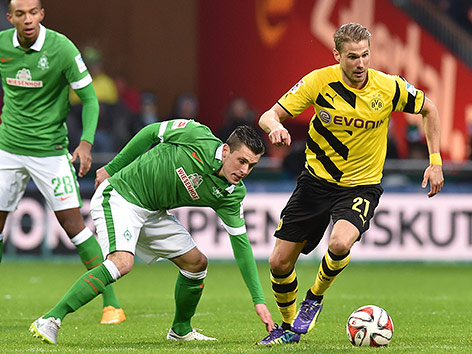 © APA/dpa/Carmen Jaspersen Zlatko Junuzovic (Werder Bremen) und Oliver Kirch (Dortmund)
